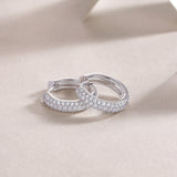 Triple row pavé moissanite huggie hoop earrings, side view—white gold vermeil