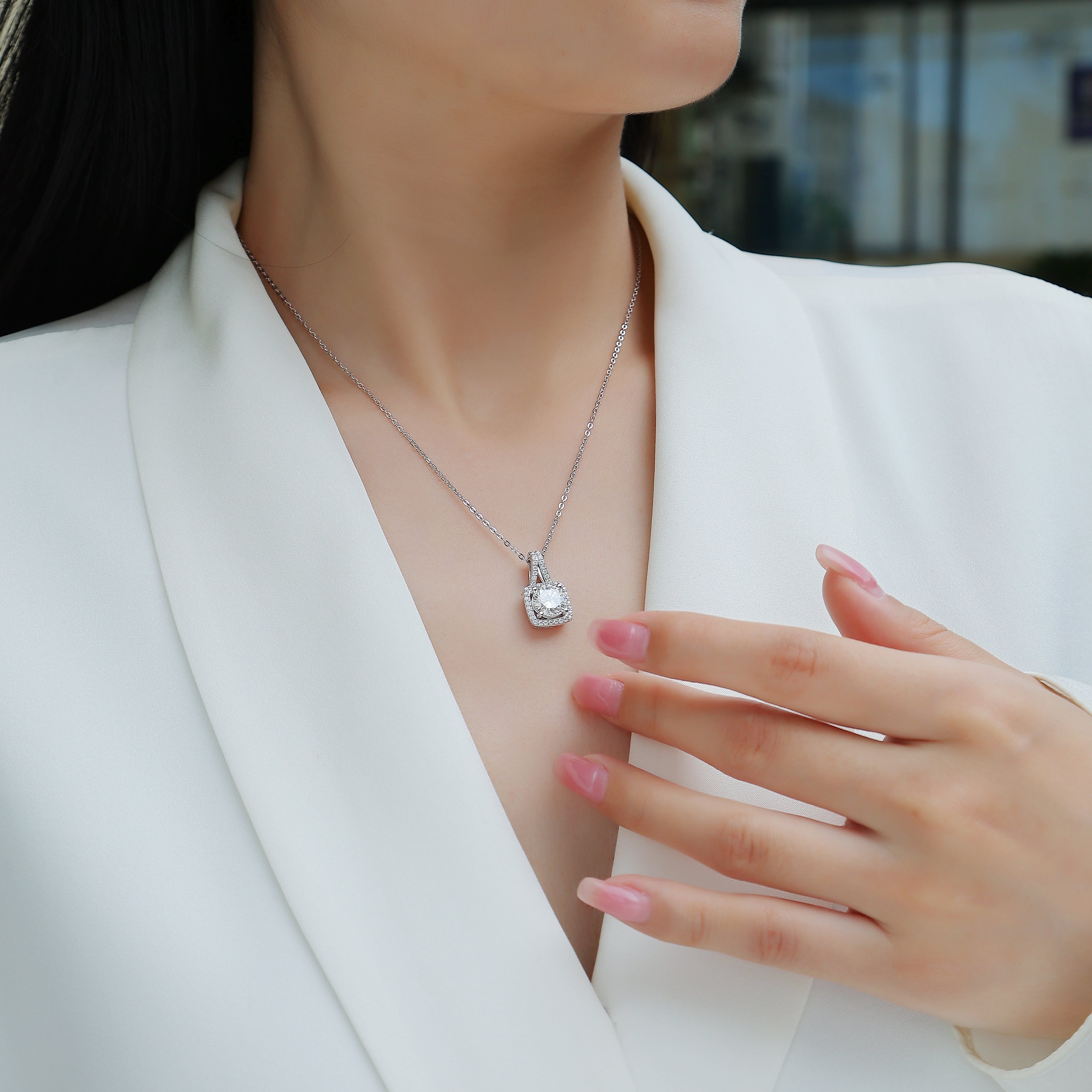 Moissanite pendant necklace on chain with cushion halo center stone and pavé edges