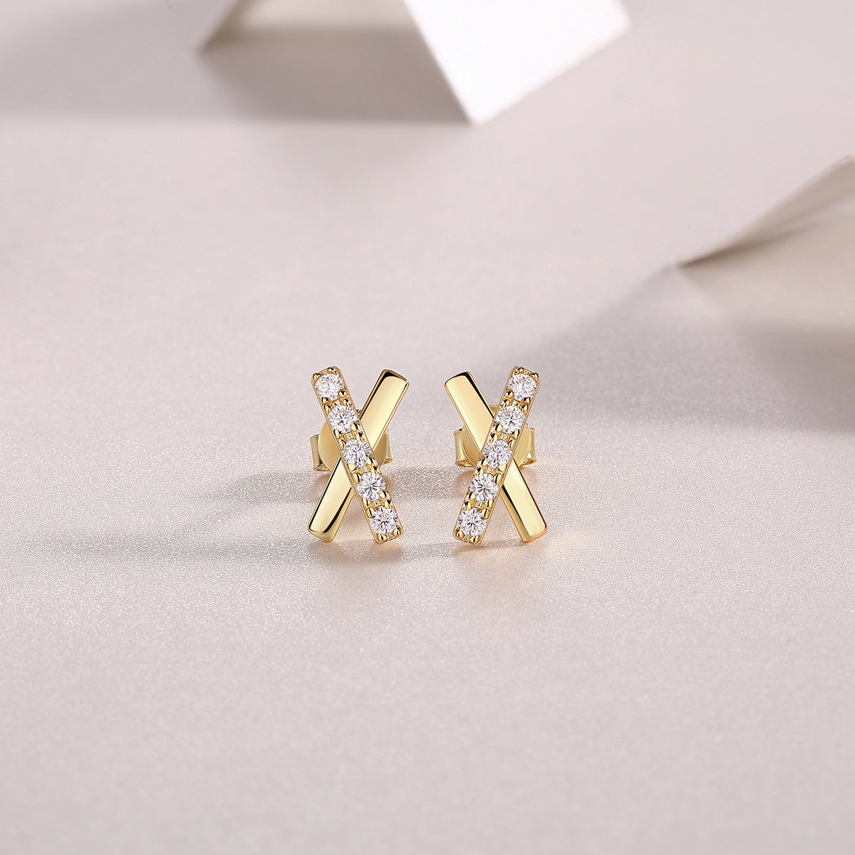 Small cross stud earrings with moissanite pave stones, yellow gold tone