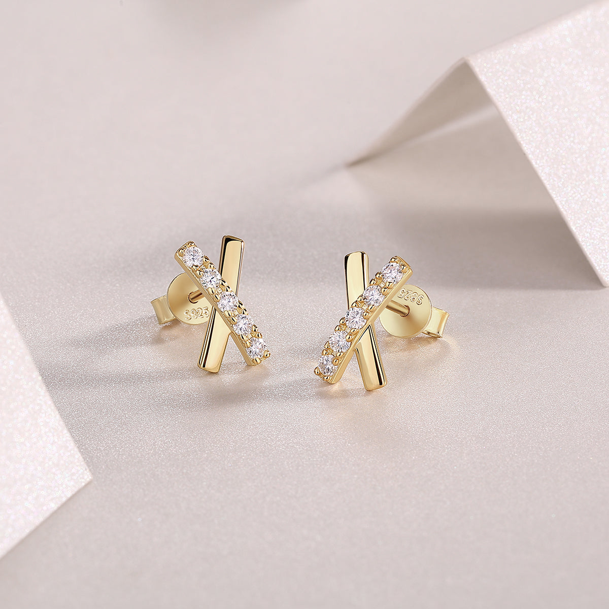 Back view of cross moissanite stud earrings with secure butterfly posts