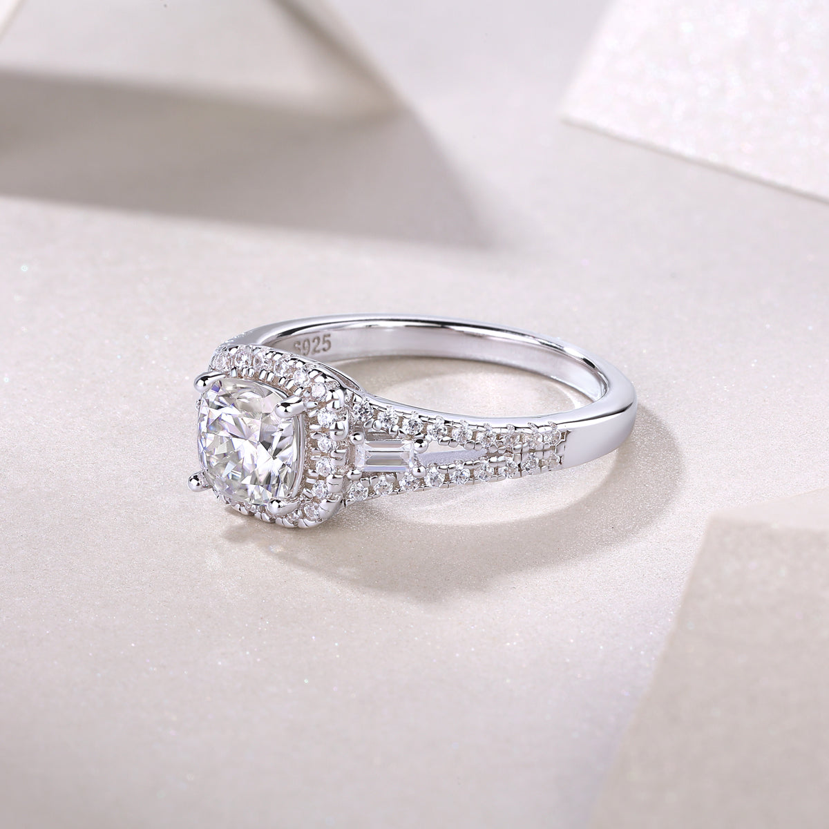 Side view of cushion cut halo moissanite ring with baguette and pavé settings, white gold
