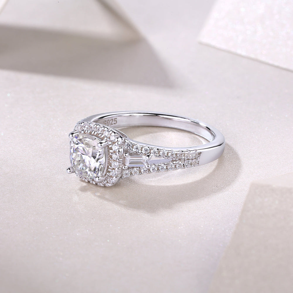 Side view of cushion cut halo moissanite ring with baguette and pavé settings, white gold