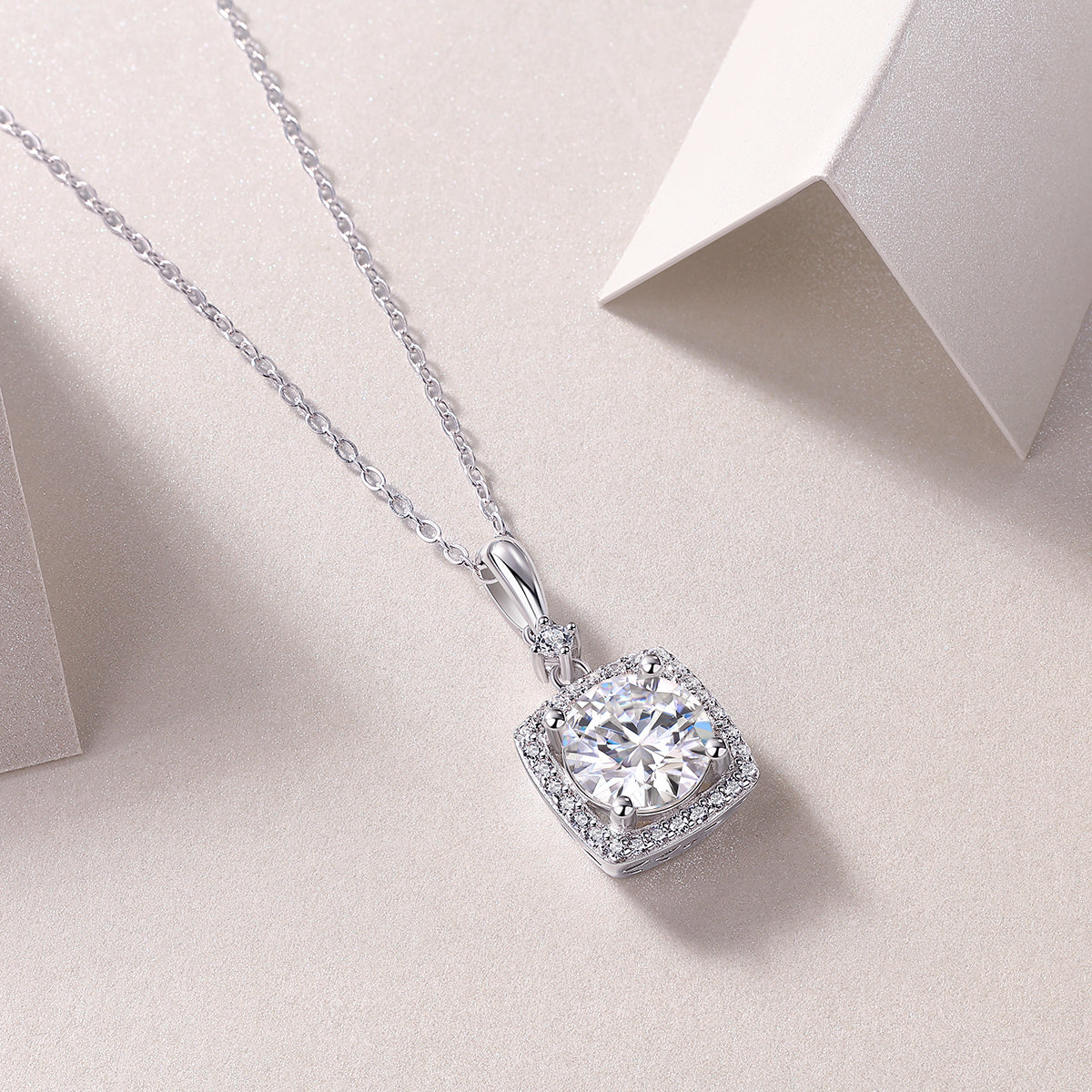 Moissanite pendant with square halo and prong-set round center, white gold vermeil chain