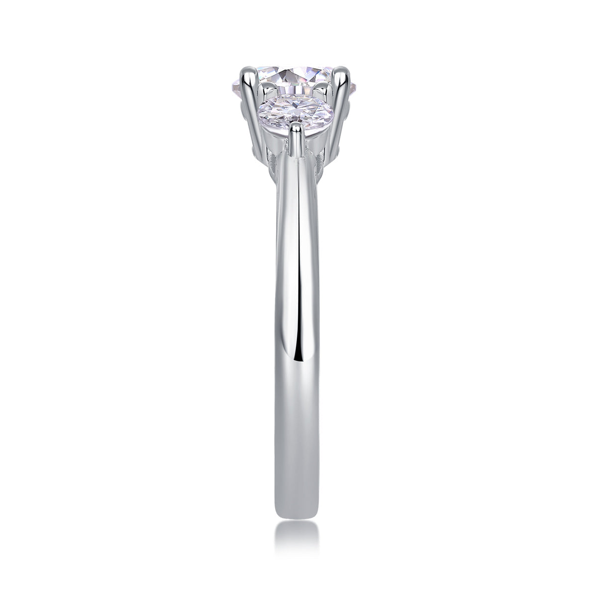 Close-up of round center moissanite with prongs on a white gold vermeil band