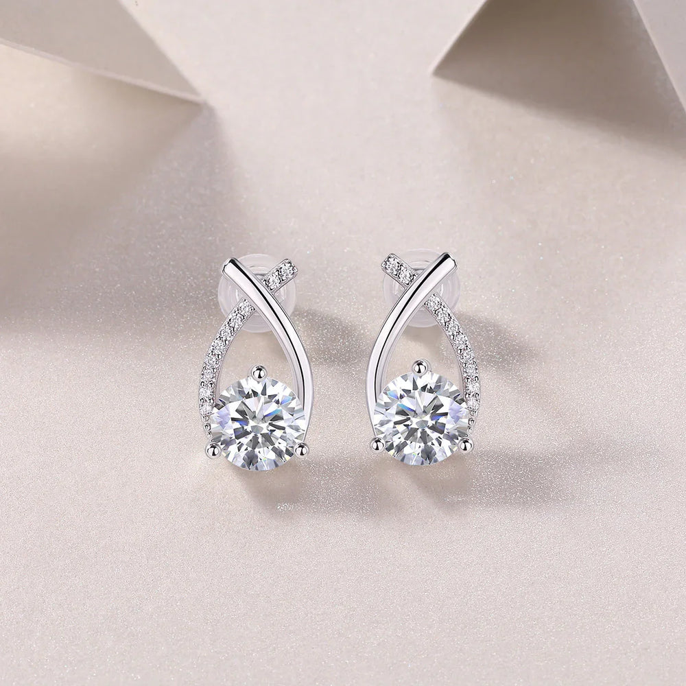 Teardrop ribbon pavé moissanite studs with bezel-set center stone and push-back