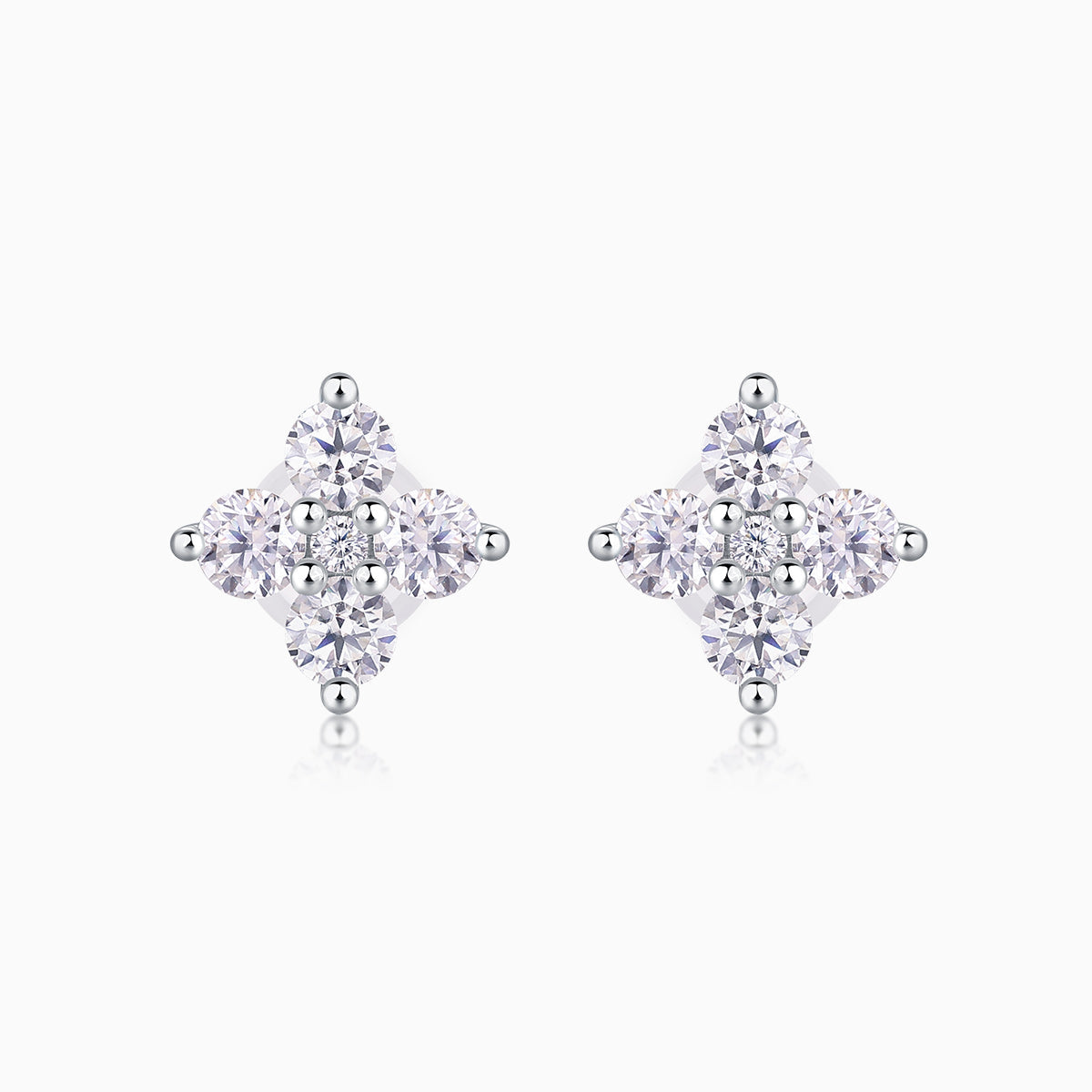 Moissanite stud earrings with four-stone cluster in white gold vermeil setting