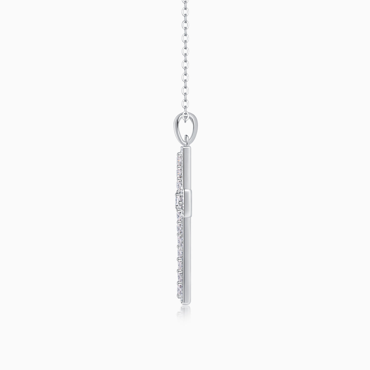 White gold vermeil pendant with pavé cross detail and oval bail on a chain