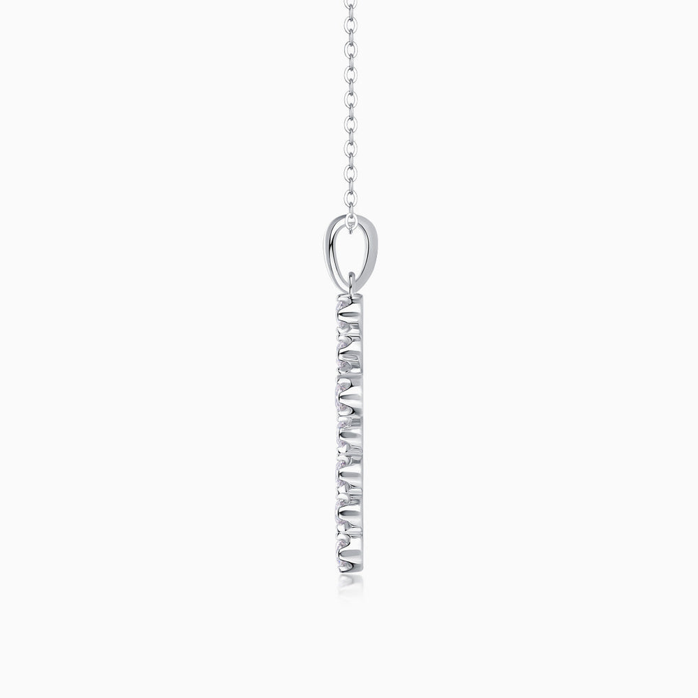 Cross pendant necklace bail and vertical row of stones on link chain