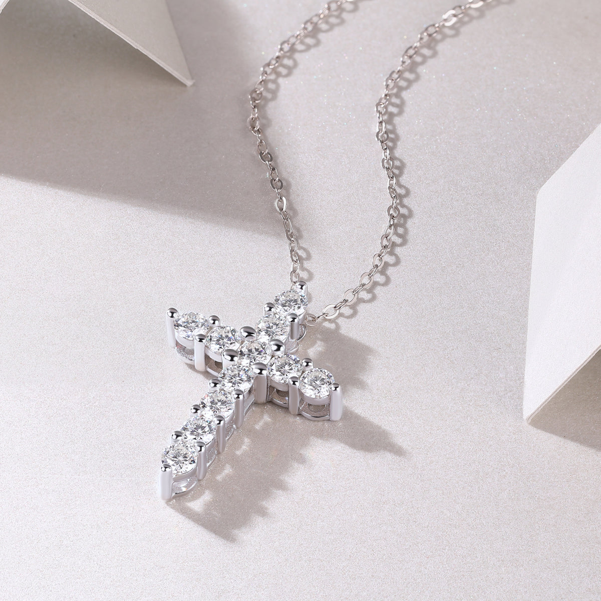 White metal round moissanite cross pendant necklace with clustered stones