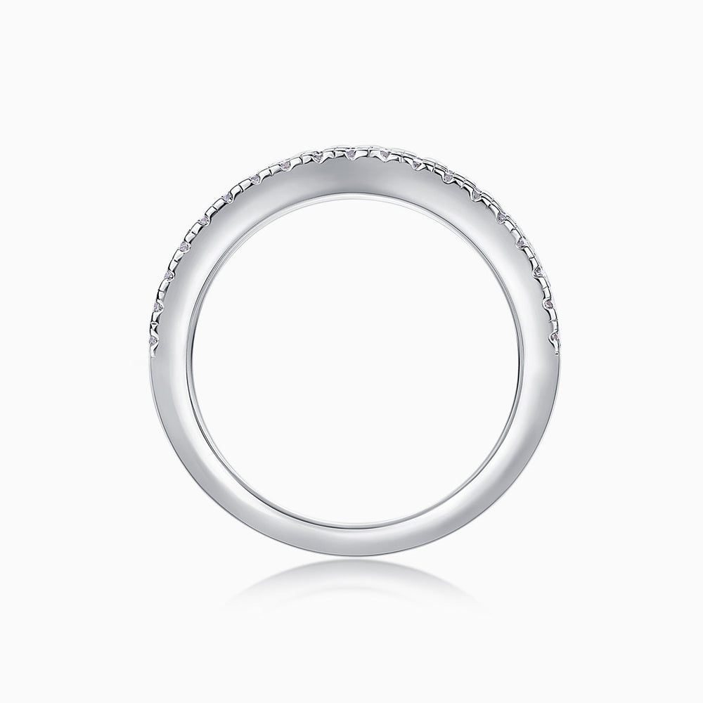 Triple row half eternity ring, side view with continuous stone bezel