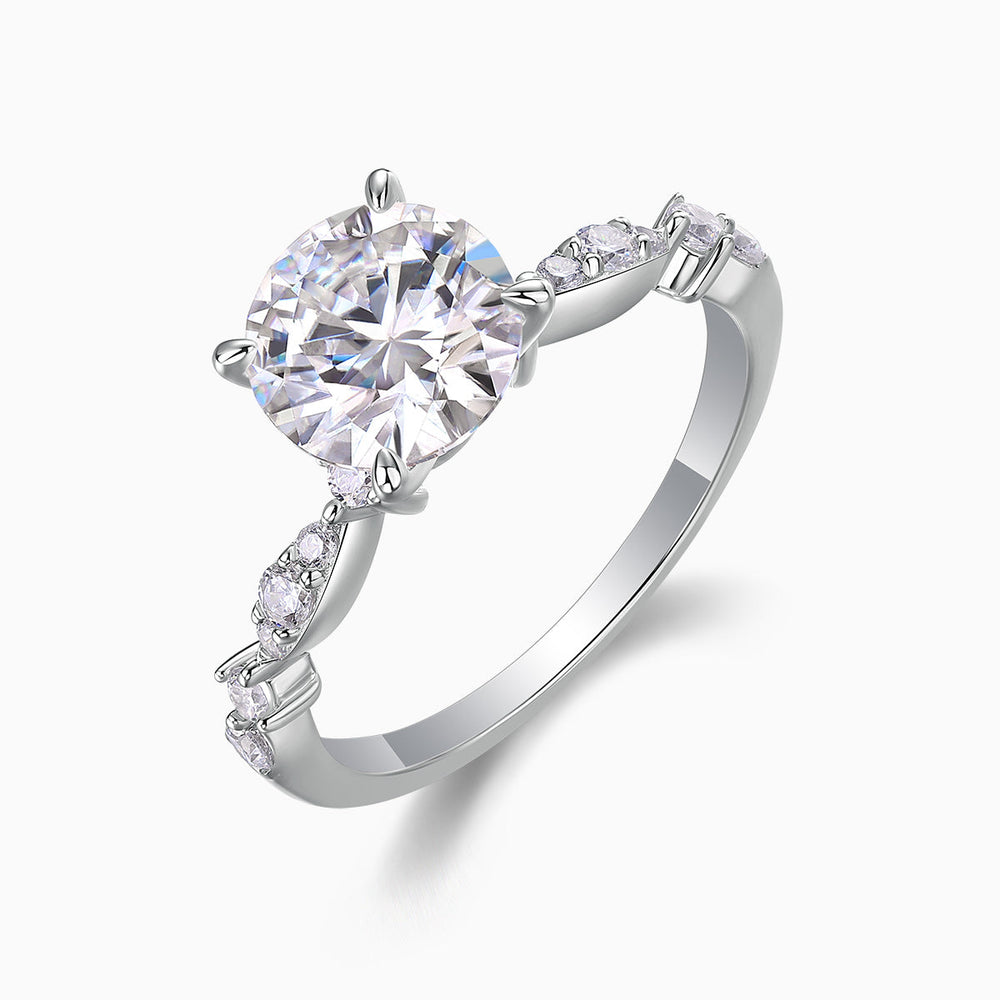 Round twist moissanite engagement ring angled view, round center with twisted prong setting