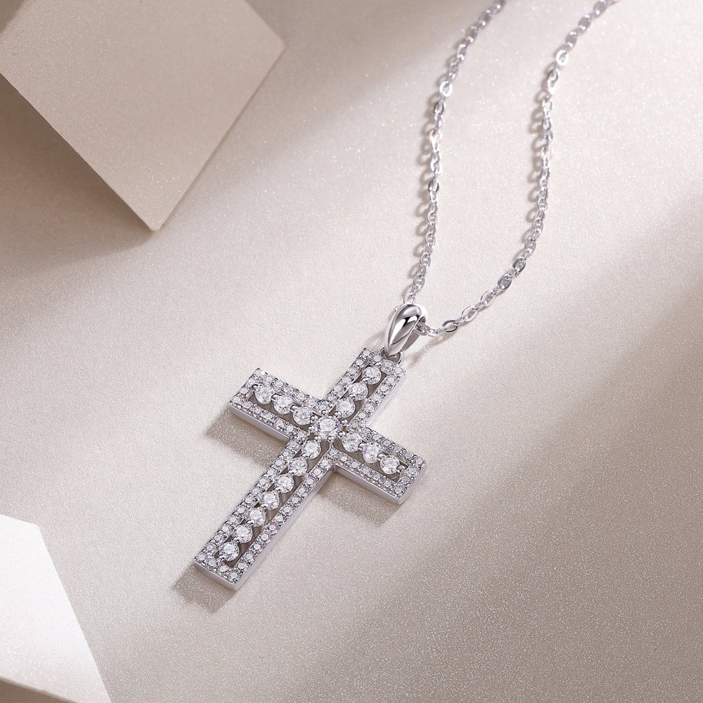 White gold vermeil pavé cross pendant with detailed stone pattern and bail top