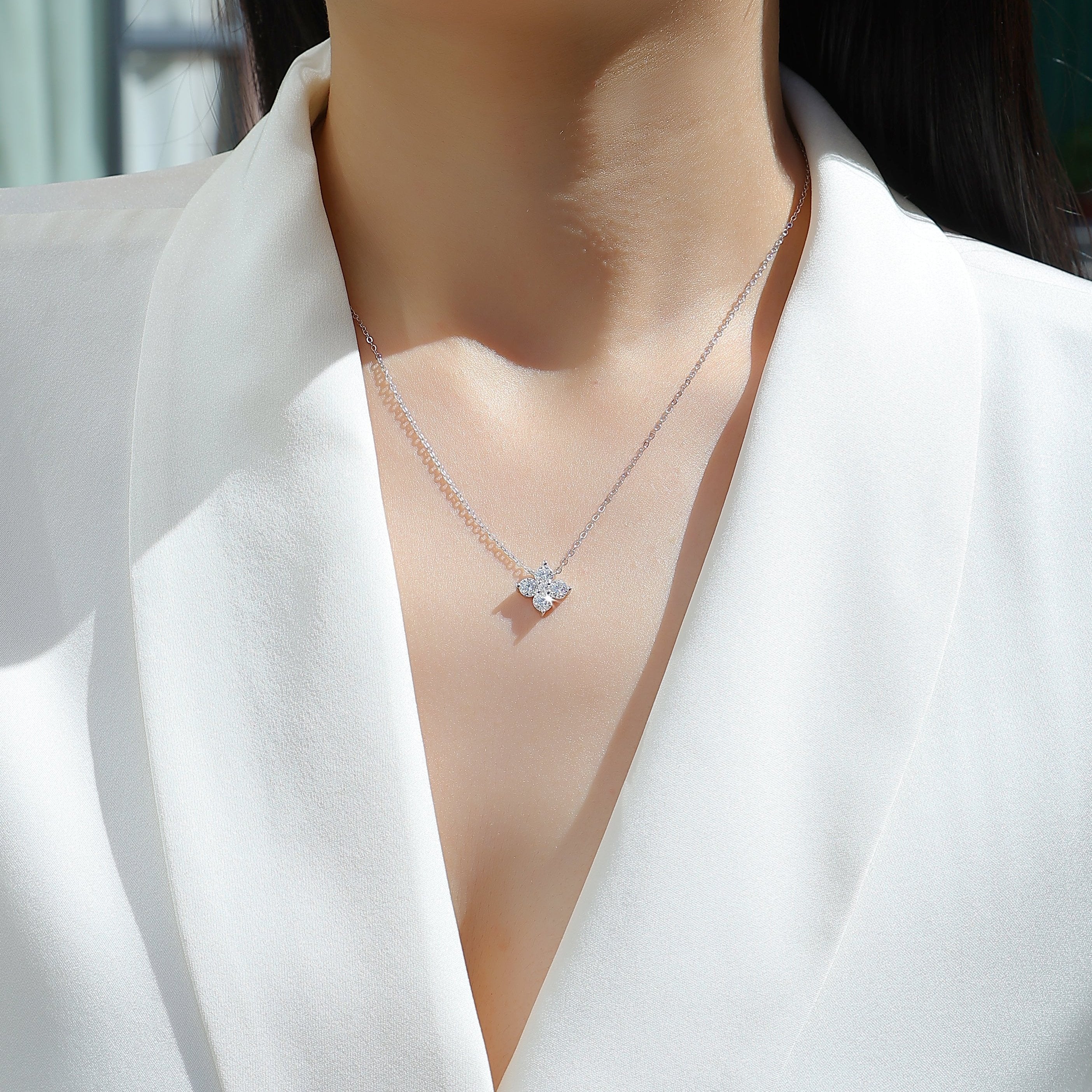 Floral cluster moissanite pendant necklace on neckline, white gold vermeil
