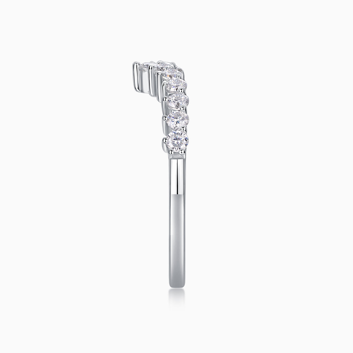 Curved Moissanite Pavé Band, side view showing stacked round pavé stones in prongs