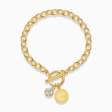 Moissanite toggle chain bracelet in yellow gold vermeil with coin charm and round stone