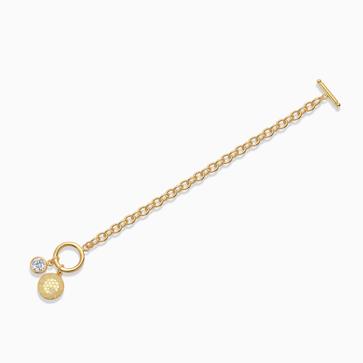 Yellow gold vermeil chain bracelet with toggle bar, coin charm, and round moissanite