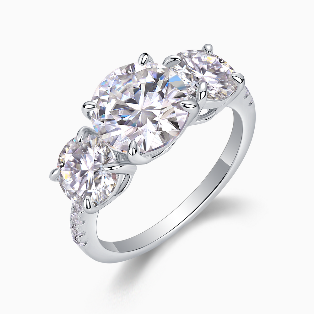 Three-round moissanite engagement ring angled view with center and two side stones