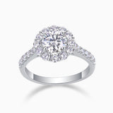 Round halo moissanite engagement ring with pavé band, white gold vermeil