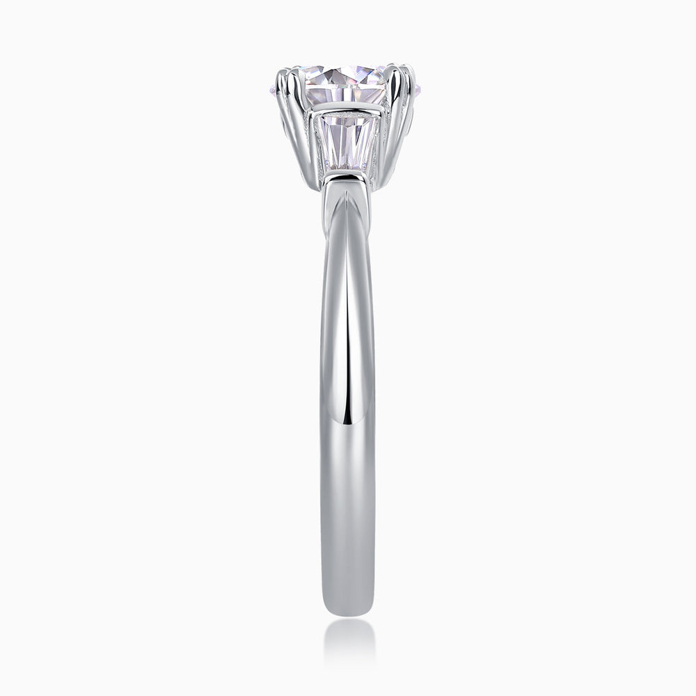 White metal ring shank with raised prong-set round moissanite center