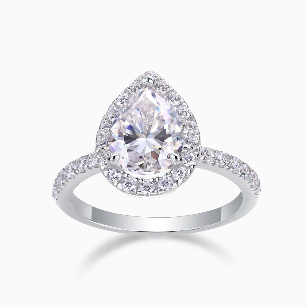 Pear-cut halo engagement ring in white gold vermeil with round micro-pavé border