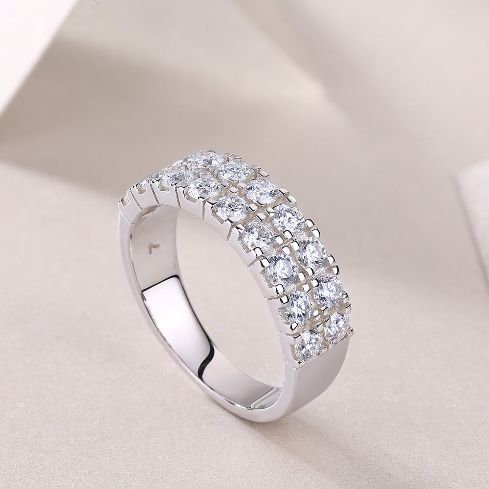 Double-row moissanite half pavé band ring close-up, showing raised square-set stones