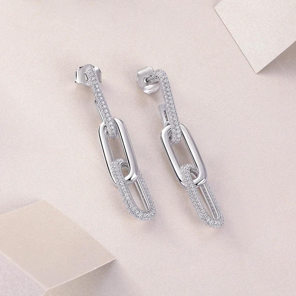 Pavé bar paperclip link drop earrings, angled view showing oval hoops and stud back