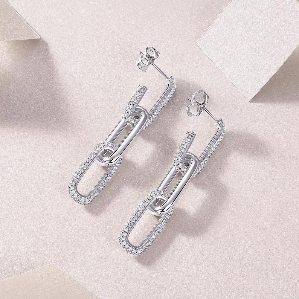 Pair of pavé bar paperclip link drop earrings, oval frames with shimmering pavé