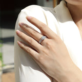 Moissanite halo ring on hand with pavé split shank, white gold vermeil