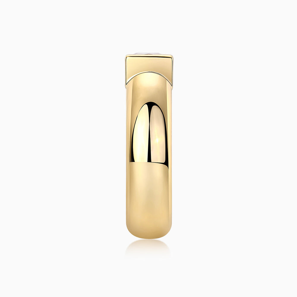 Profile view of yellow gold vermeil solitaire ring with square-set moissanite