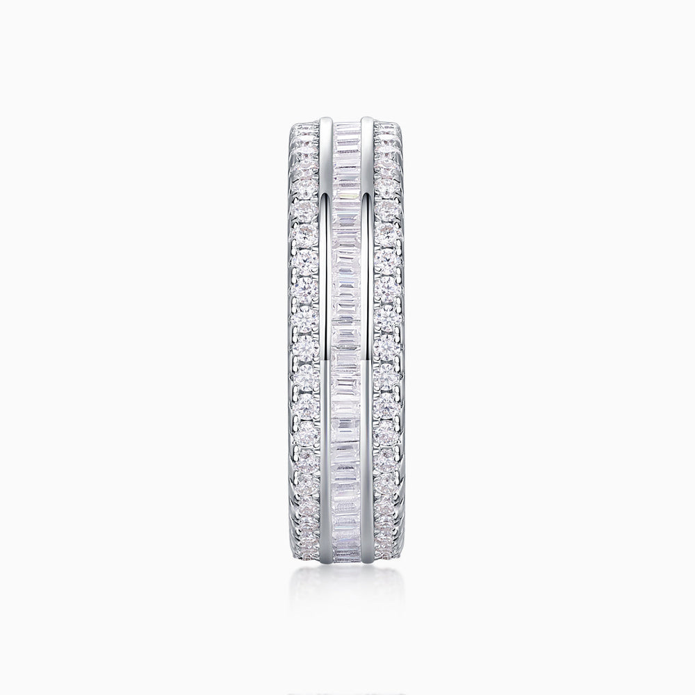 Side view of three-row eternity band with pavé stones and baguette-style center