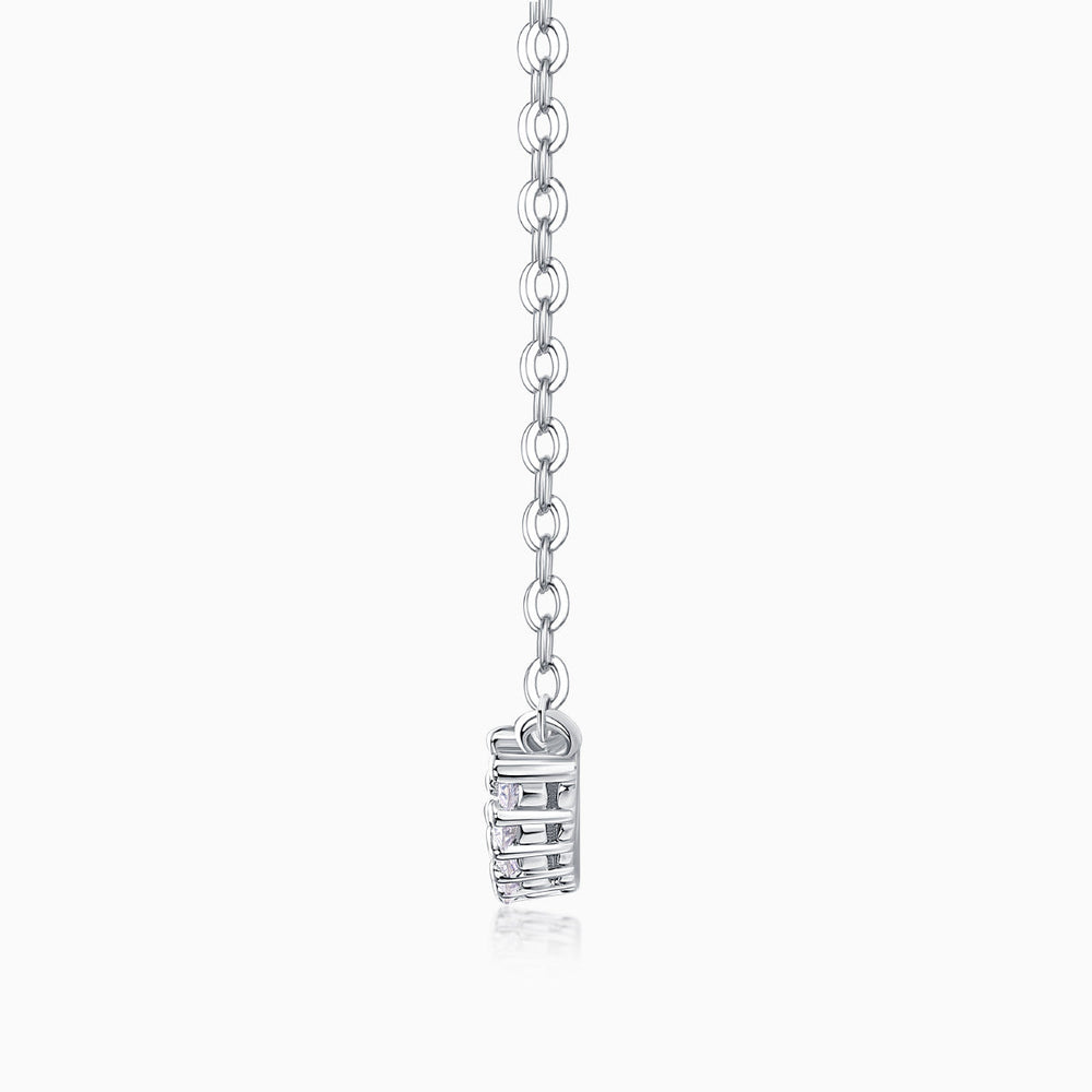 Moissanite smile necklace clasp detail with rows of small stones on the pendant-style bar