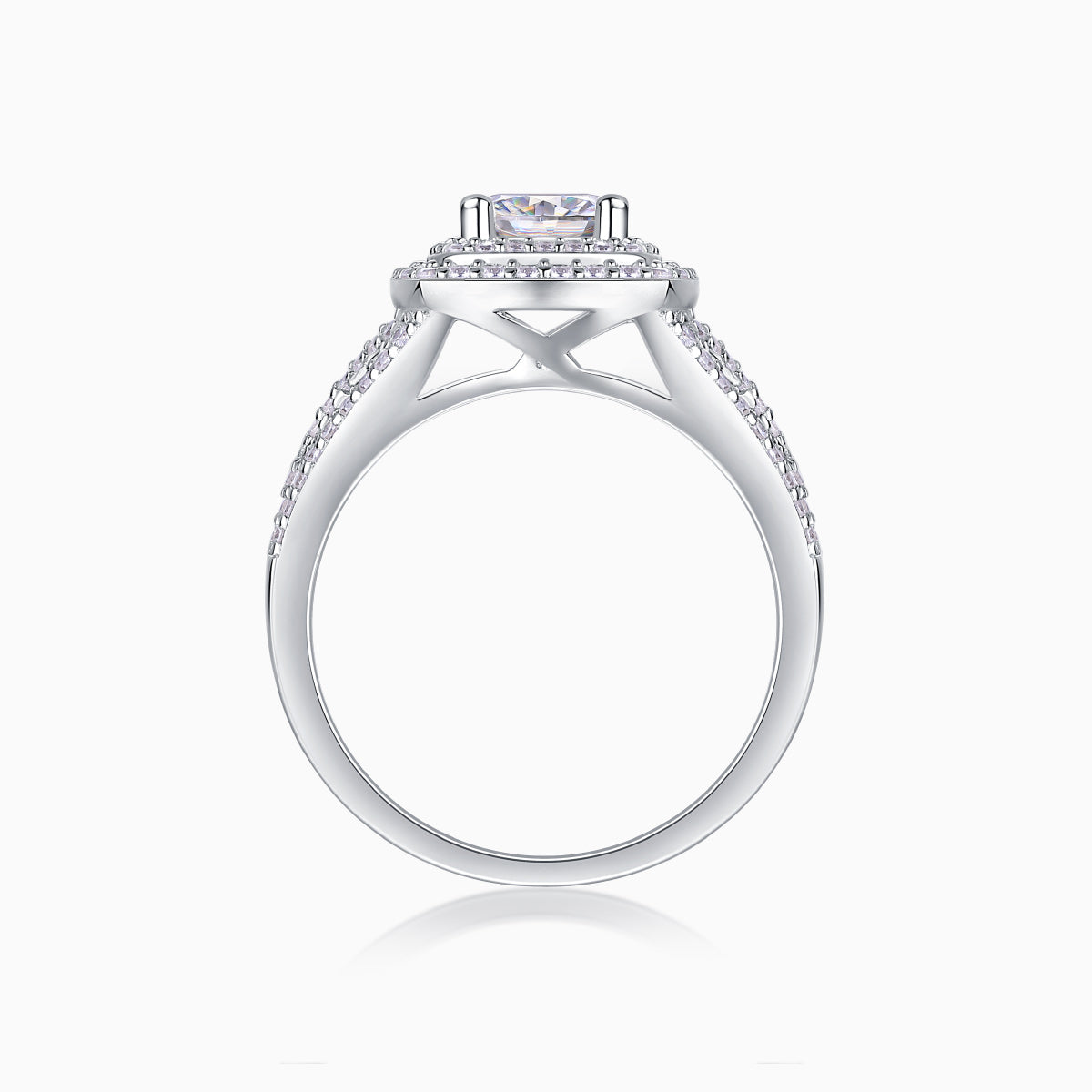 White gold-plated ring with cushion center and halo prongs, side view