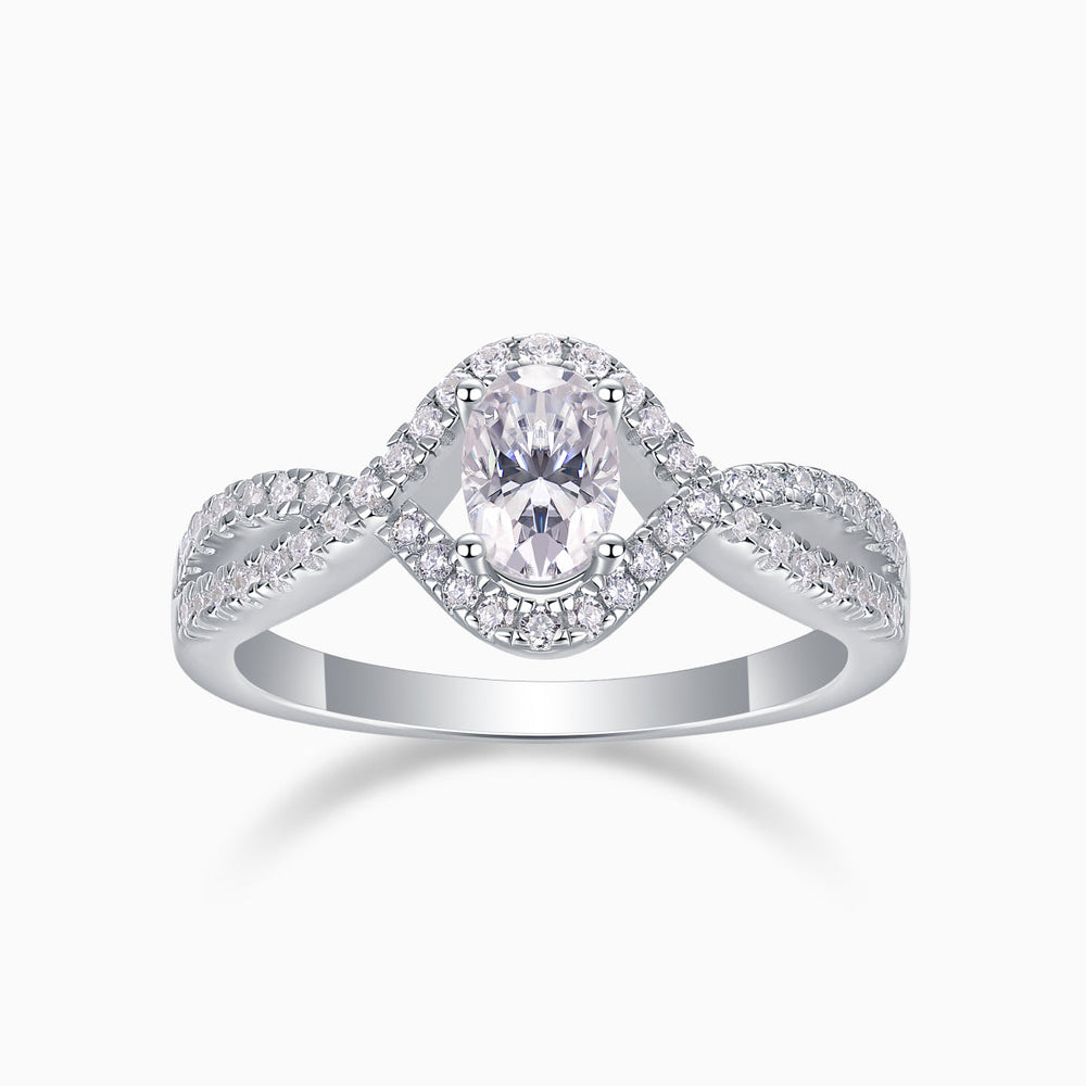 Oval halo twist engagement ring with pavé moissanite, oval center, white gold vermeil