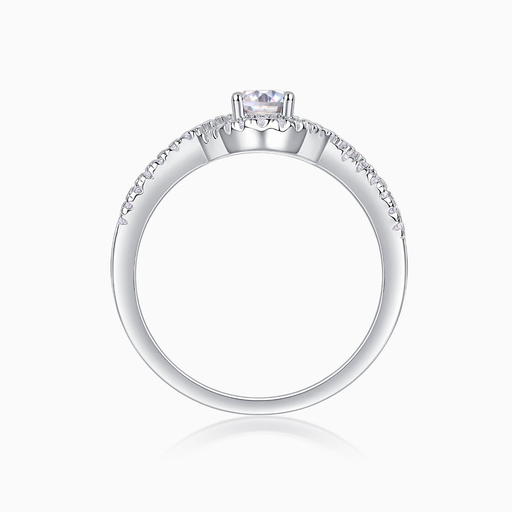 Side view of oval halo engagement ring with pavé setting, white gold vermeil band
