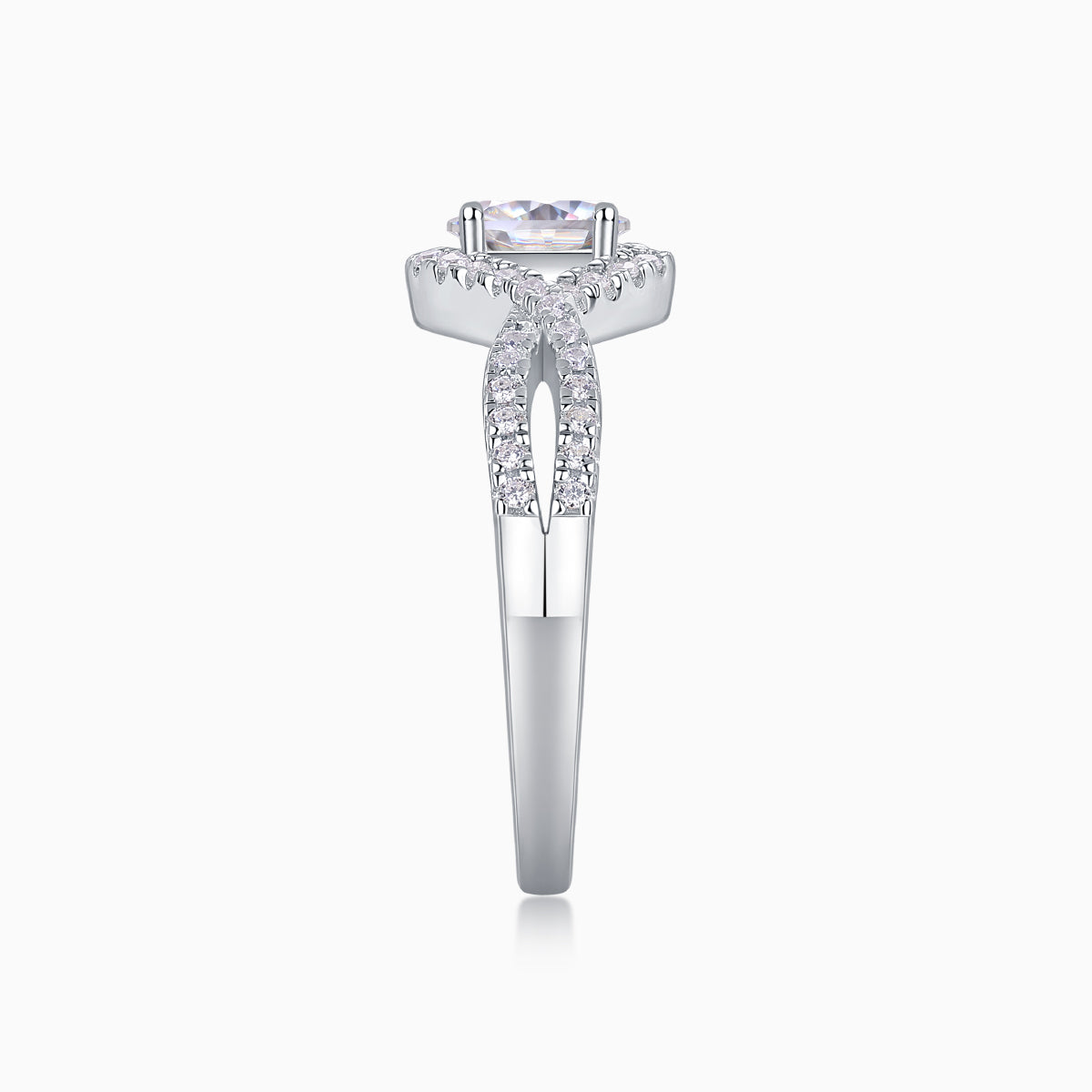 Top view of oval halo moissanite engagement ring with pavé accents, white gold vermeil