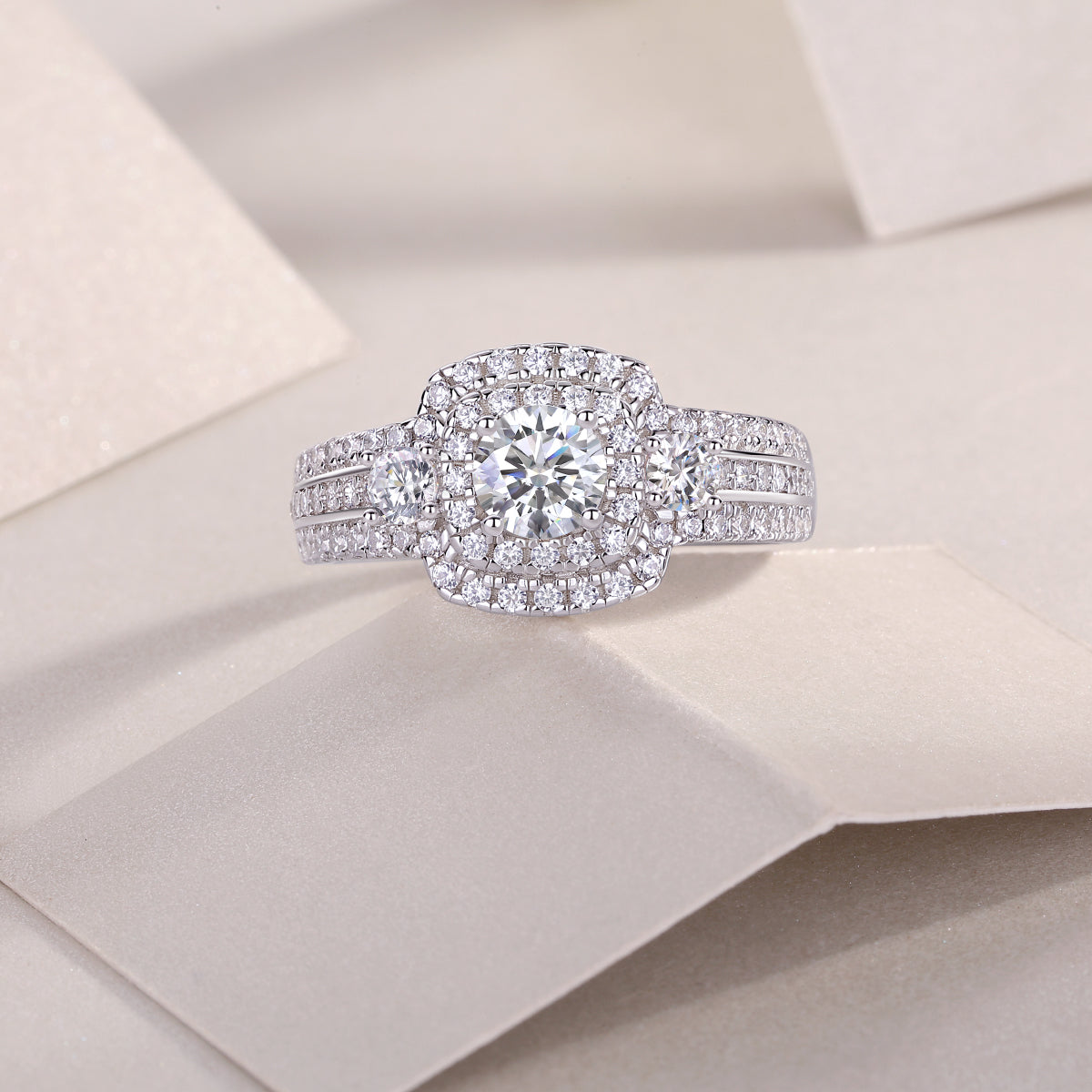 Square center moissanite ring with double halo and pavé band, front view