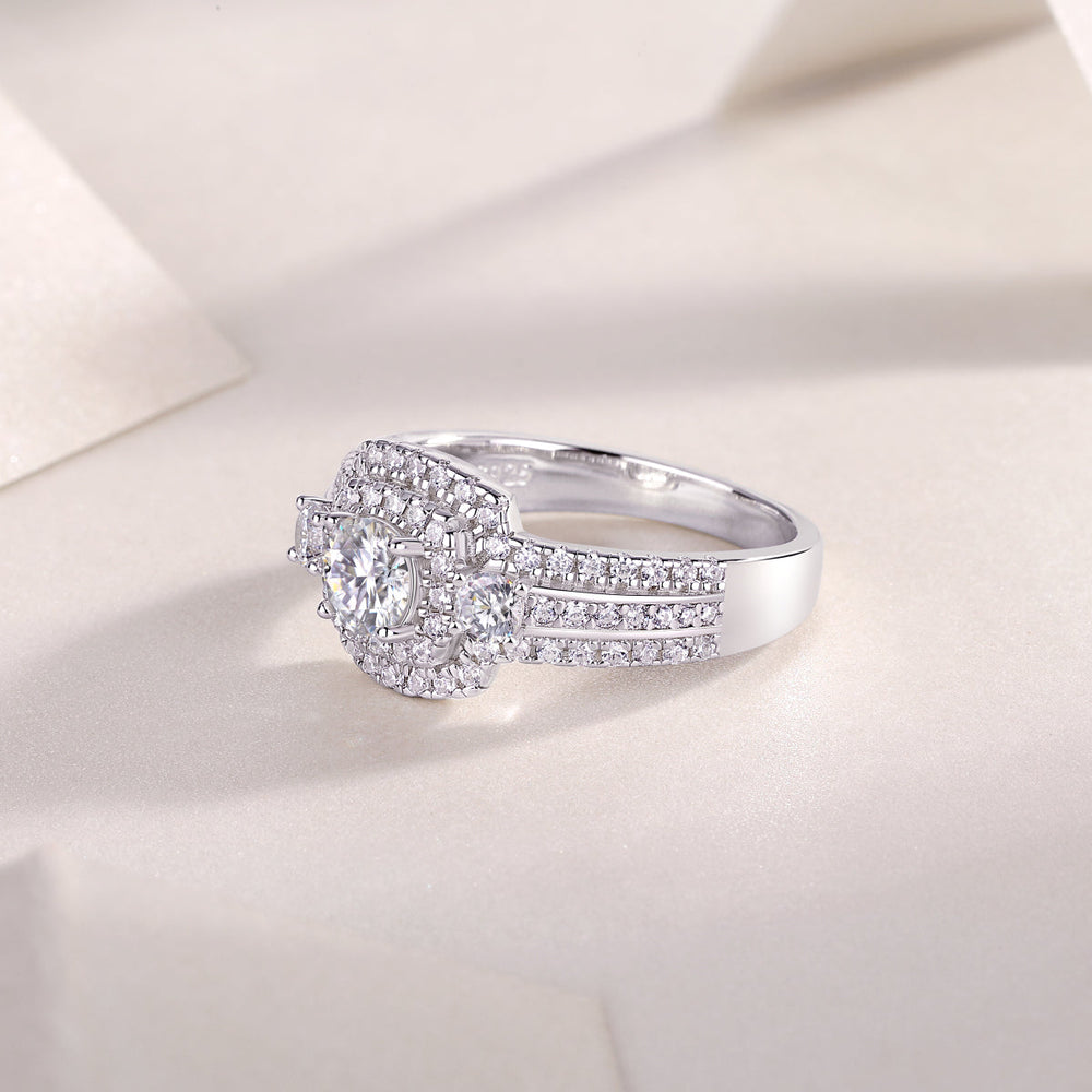 Moissanite square halo ring with pavé shoulders, angled view