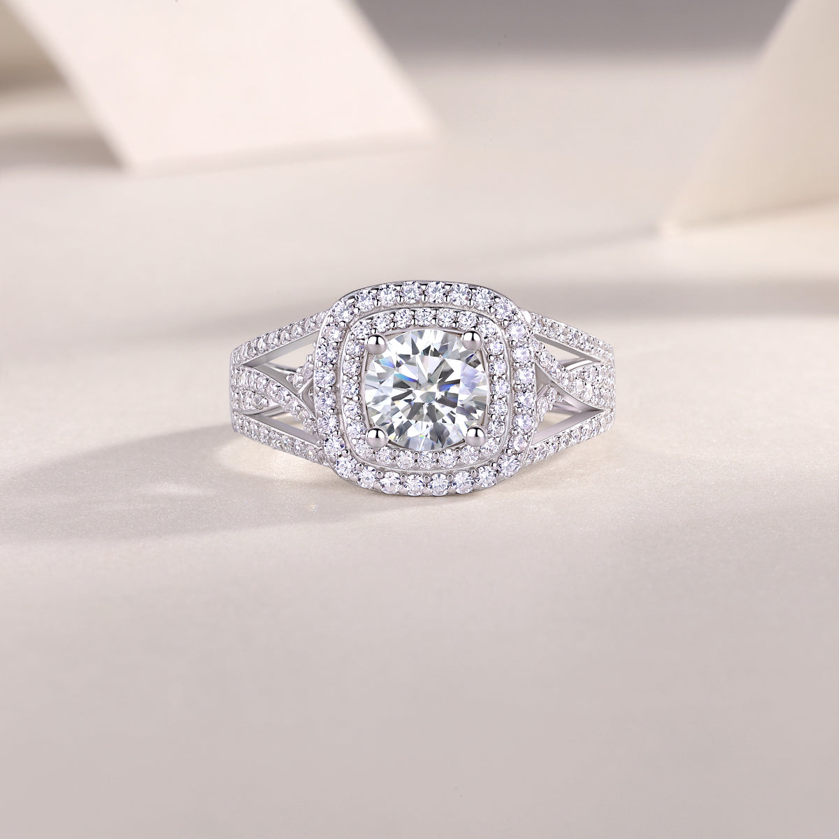 Moissanite cushion halo engagement ring with split shank, white gold-plated metal