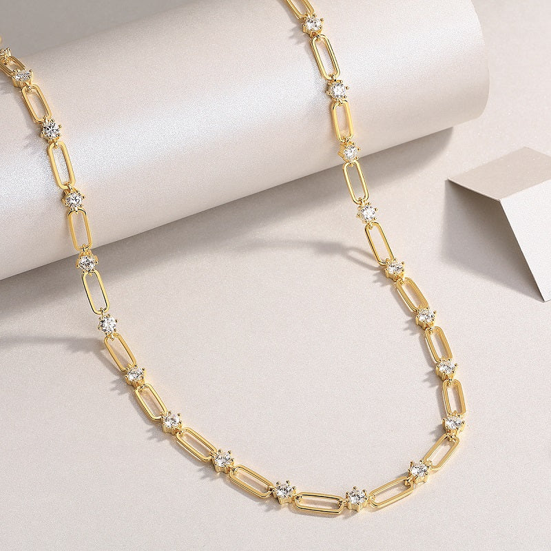 Yellow gold vermeil moissanite station chain necklace with paperclip links and round stones