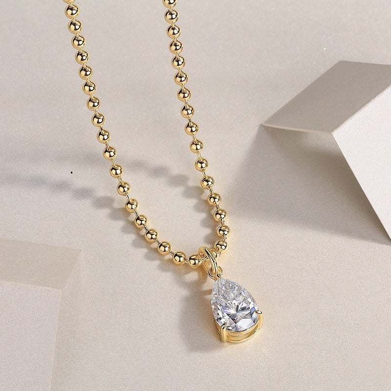 Yellow gold vermeil beaded chain necklace with pear moissanite solitaire drop