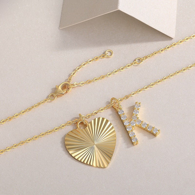 Heart charm and K initial moissanite on yellow-gold vermeil chain with clasp