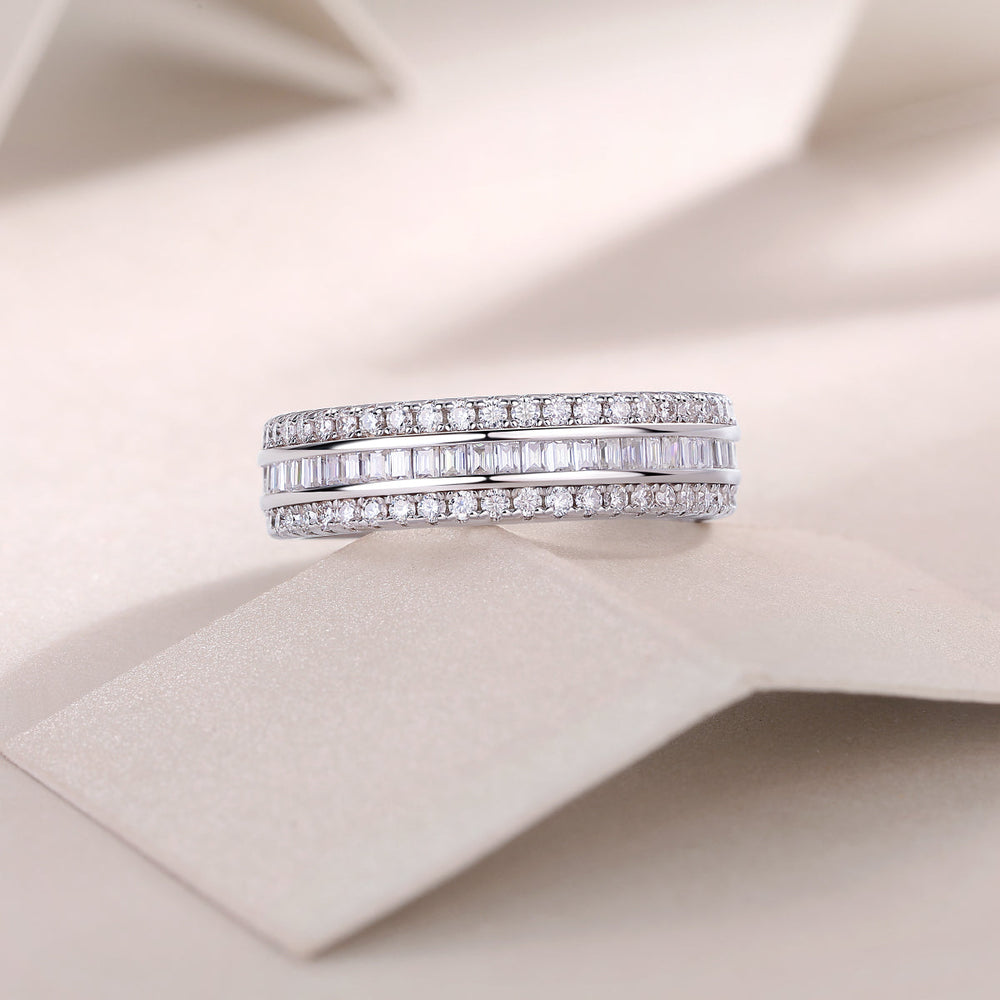 Three-row eternity band with pavé rows on a white gold vermeil base