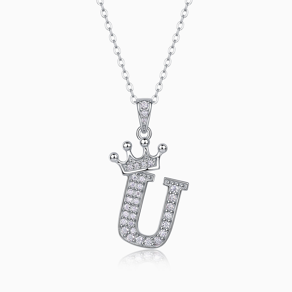 Crown moissanite initial pendant necklace, letter J in pavé sparkle on a chain