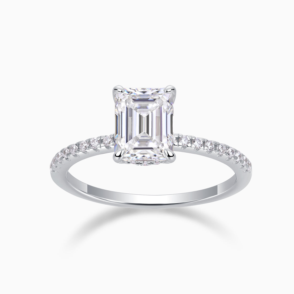 Emerald-cut moissanite engagement ring with pavé band, white gold vermeil setting