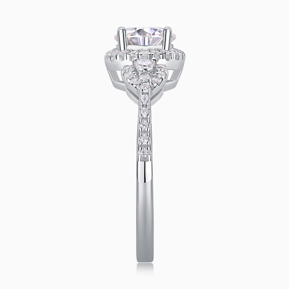 Front view of round halo moissanite ring with pear side stones on a slim band