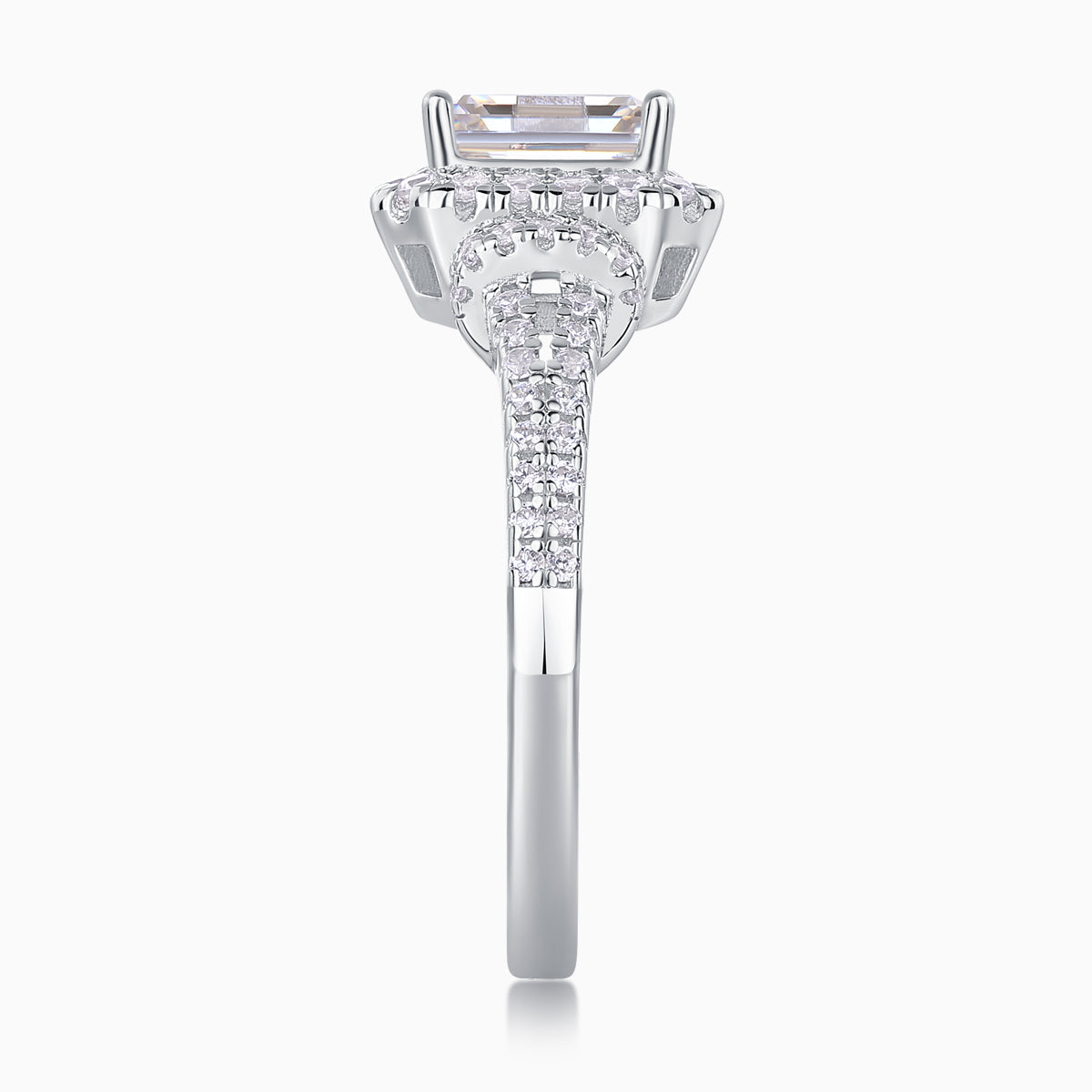 Top view of emerald-cut halo moissanite ring with pavé set details