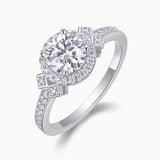 Side view of round halo art deco cross pavé ring with halo stones and cross accents