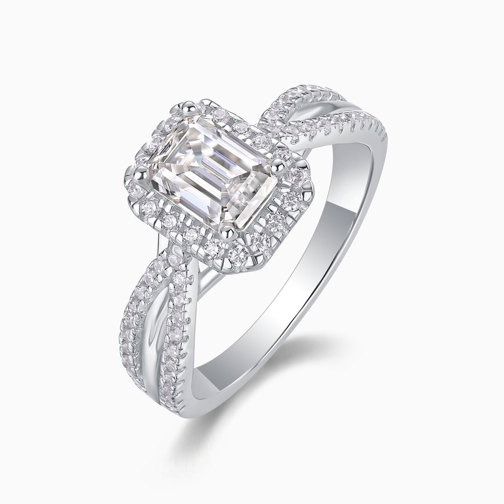 Emerald-cut halo moissanite ring with twisted pavé band, white metal