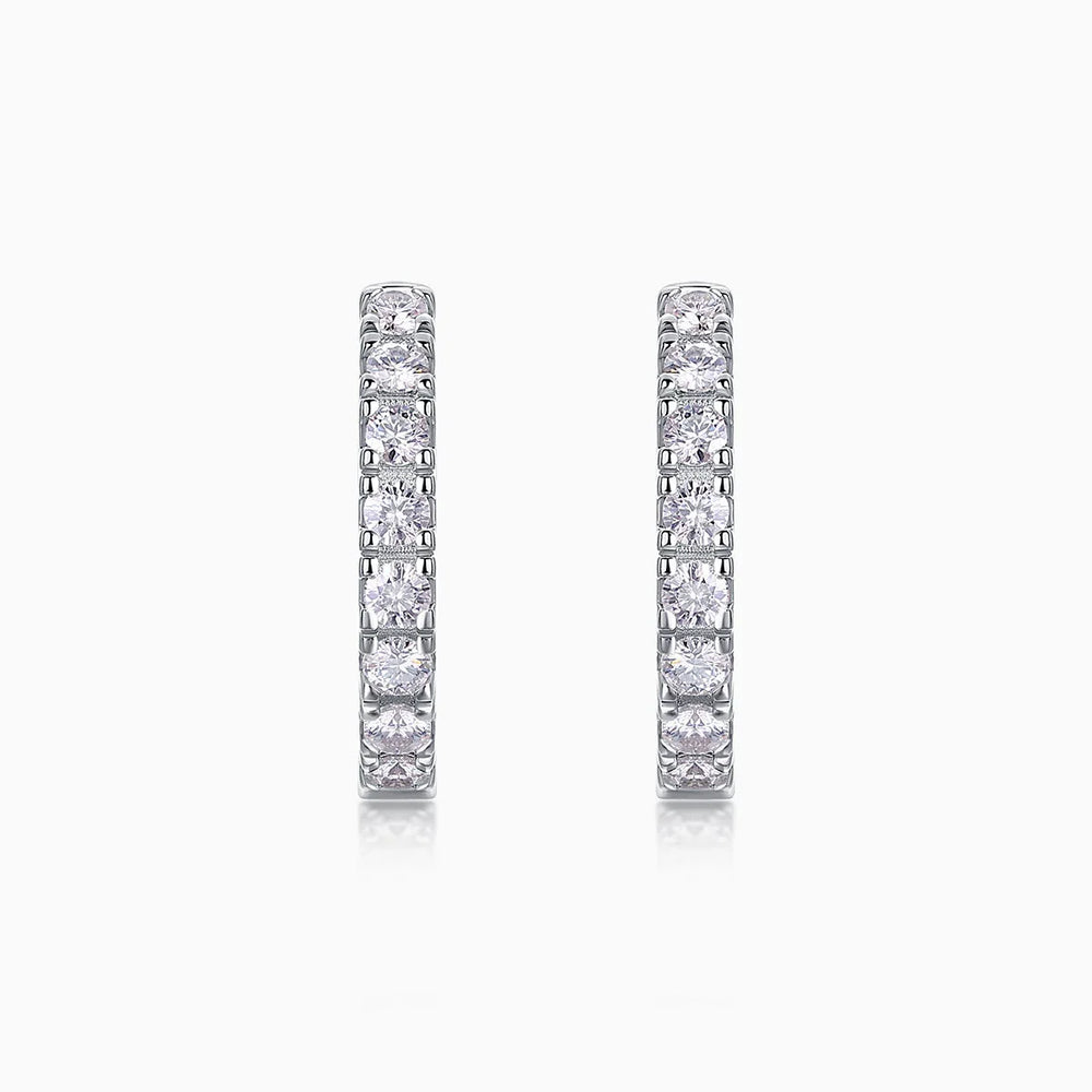 White gold vermeil huggie hoop earrings, single row moissanite in shared prong settings