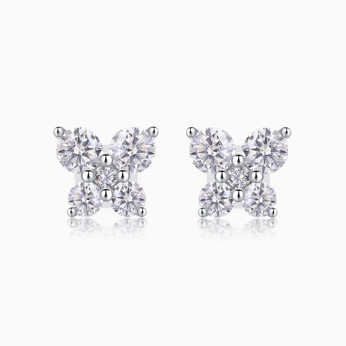Four-stone clover moissanite stud earrings in white gold vermeil, round stones